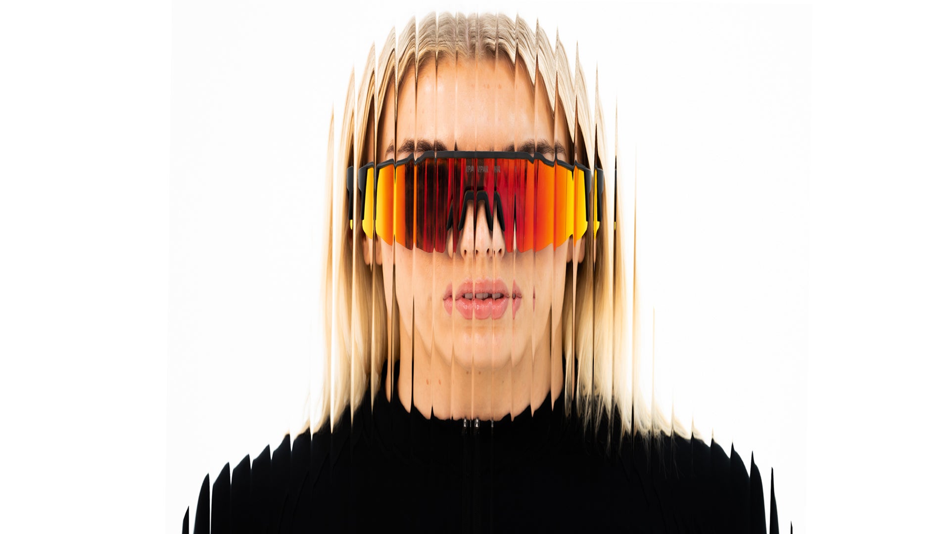 Girl wearing the A'PAIR concorde sunglasses behind fluted glass